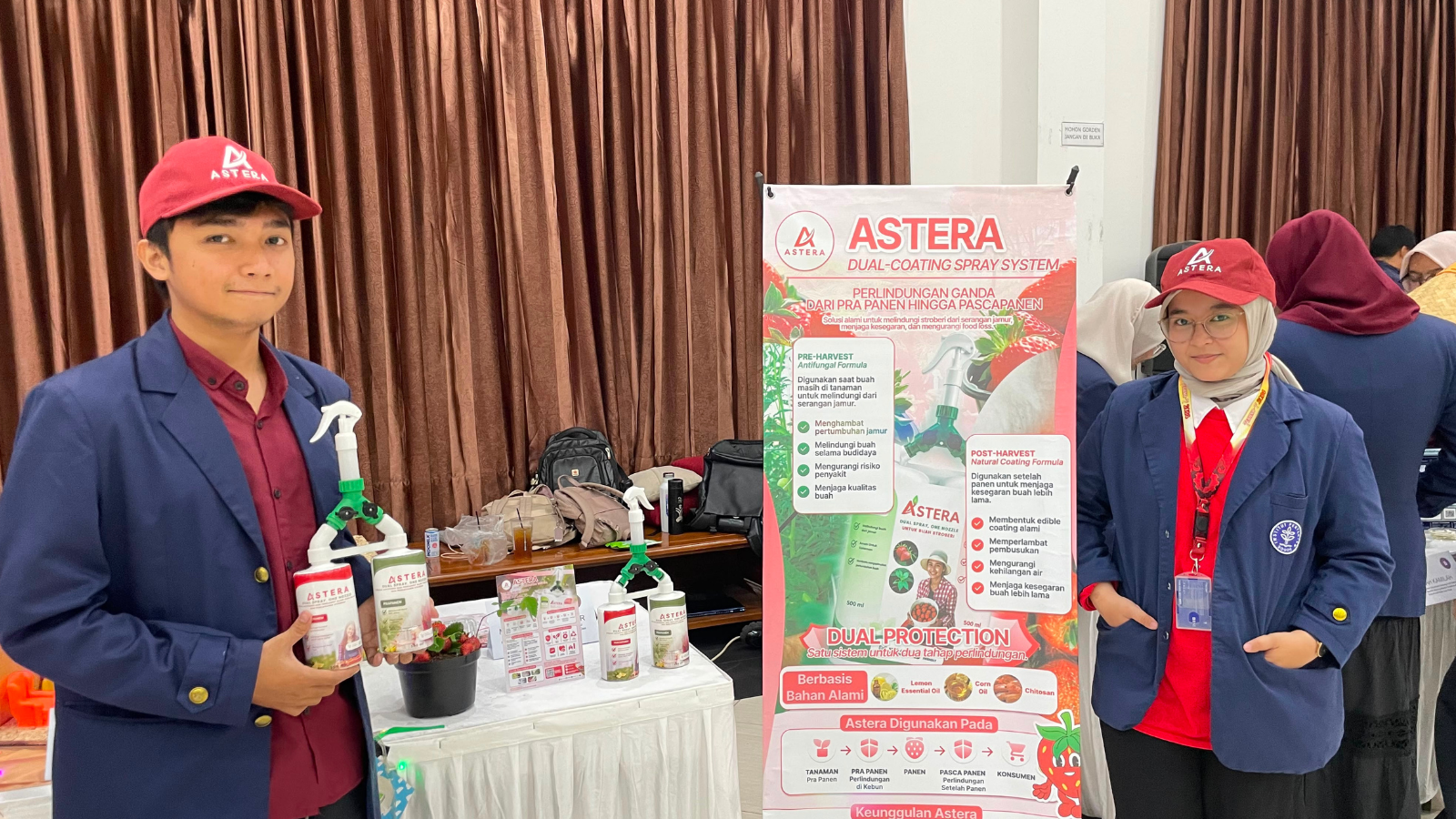 Team members introducing the Astera product to exhibition visitors